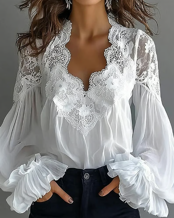 Lara - Blusa com renda floral e mangas de lanterna